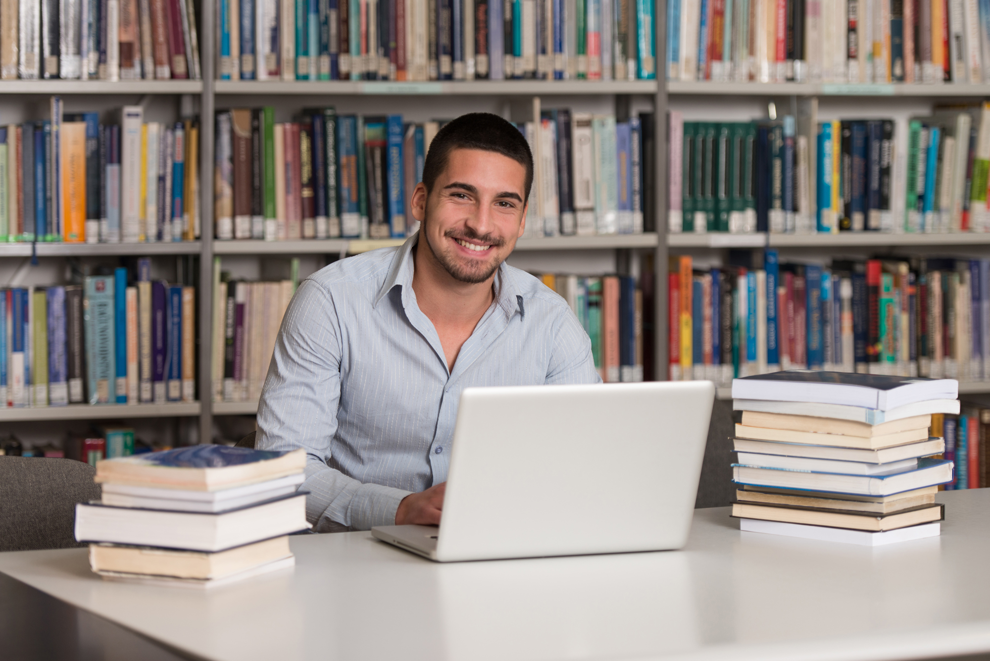 Man Studying In Library